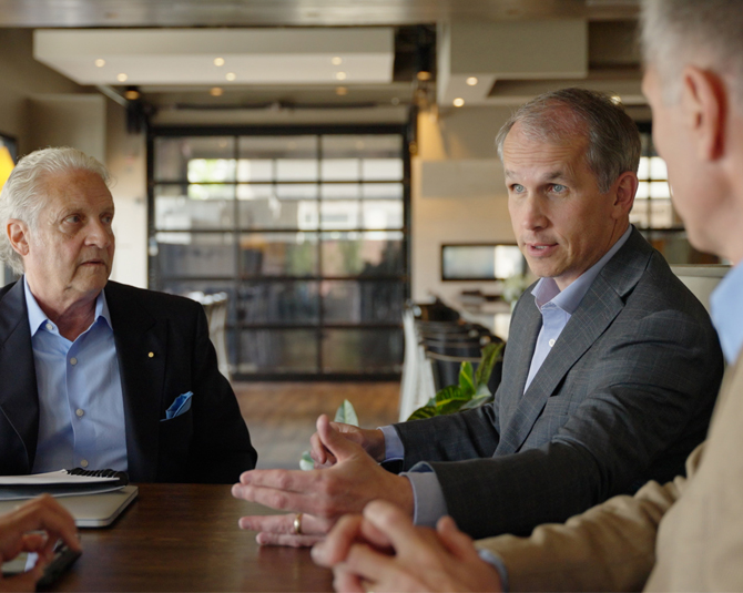 Owners of Momos meet with Cornhusker Bank members