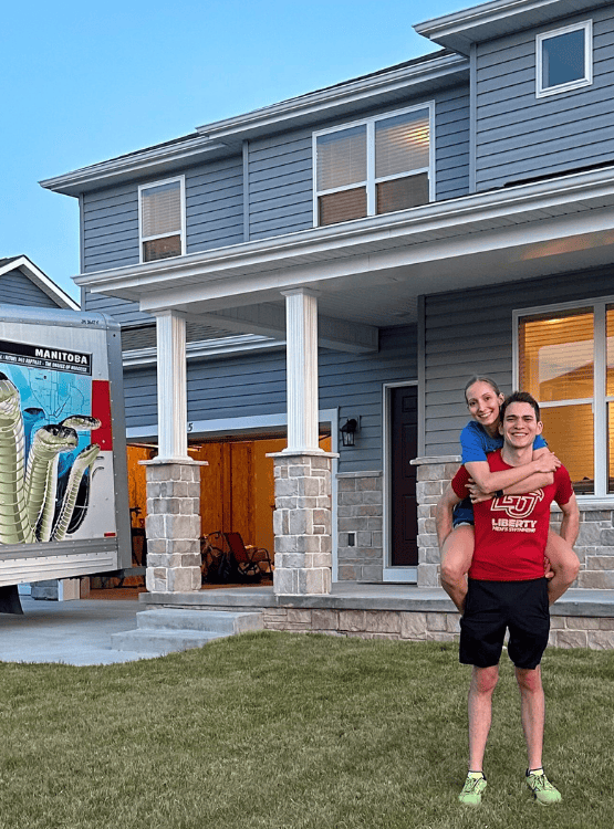 First-time homeowners moving into new home. 