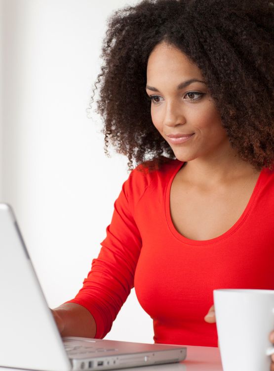 Woman working on her laptop computer.