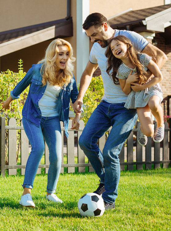 Family playing in backyard.
